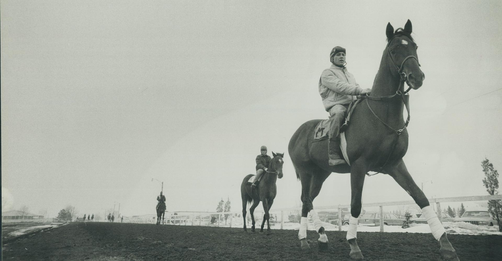 Exercise rider Fenton Platts gives one of Bill Marko's horses a workout in preparation for the spring race meeting at Greenwood. The $22,000 Dufferin Handicap is the track's opening-day feature