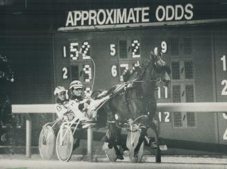 In the second race, John Holmes drove Wavelength to victory while punters avoided the chill and watched from the grandstand