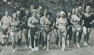 They're jogging into fitness. Moving out of the North York Young Men's Christian Association building into the frest air, some of the 25 women in a fi(...)