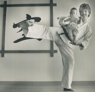 Karate instructor Gary Lynch, 36, cares for Sean during the day while his wife works