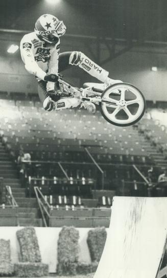 A bicycle built for flying. BMX bicycle riders from California showed motorcycl fans the excitement of pedal power yesterday during an intermission at(...)