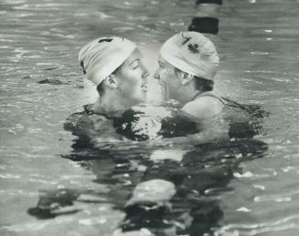 Swim stars take centre stage. A quarlet of front-runners ham it up for the Cameras at yesterday's Olympic swimming trials at Etobicoke Olympium. Nose (...)