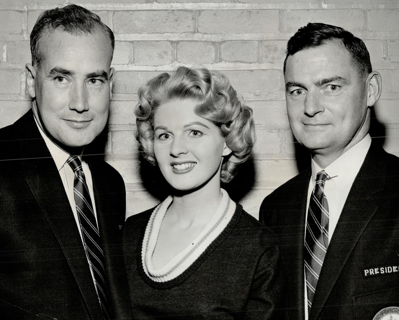 James Worrall of Toronto, chef de Mission of Canadian Olympic Association teams, Joan Fairfax of the Denny Vaughan show, Kenneth Farmer, President of the Canadian Olympic Association