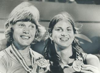 Diane Jones Konihowski, left, and Jill Ross display gold and bronze medals won in pentathlon