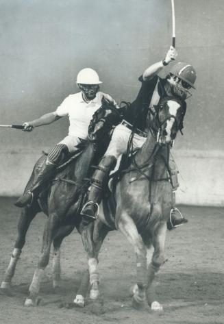 Nice body check!, Hockey isn't the only sport that produces crunching body contact as this clash in a Canadian-American charity polo match yesterday a(...)