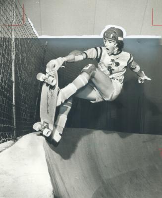 Hang On! Charlie Kert, 16, earns his wings in the gravity game skateboarders play at their own Superbowl Skatepark, Midland and Lawrence Aves. It's ne(...)