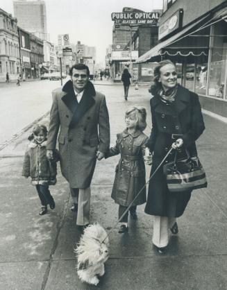 Leduc Skating Family See Sights of Downtown Toronto With parents, Bob and Kathy are Suzie, 4, Joy, 9, and their dog Sugar Leduc