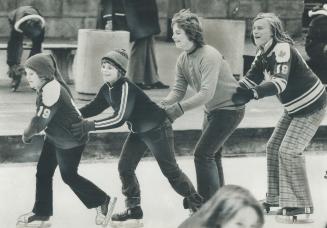 Youngsters are already enjoying outdoor skating on the rink in Nathan Phillips Square