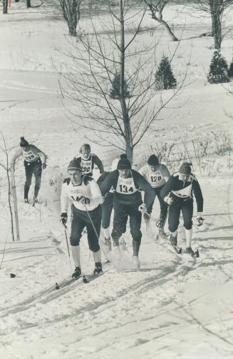 Risto Santala of Sisu Ski Club leads men's open cross-country race at Pioneer Village Saturday