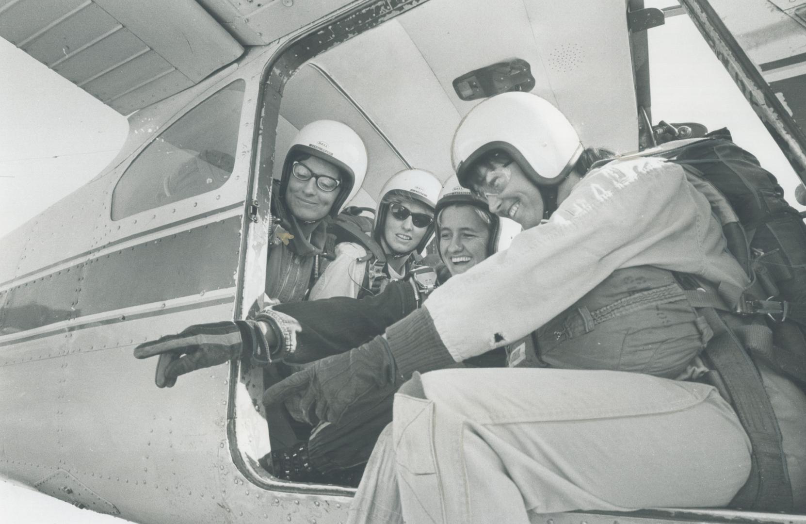 Four female members of the team get into the plane to make group jump, This is the first time Canada has sent a full women's team to world championships, this year in Austria