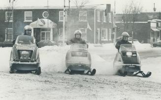 Snowmobiling is more like motorcycling, says reader, below, than a true outdoor sport like snowshoeing