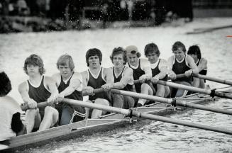 Stroking for finish line, Upper Canada College crew is en route to winning 135-pound eights event at Toronto and District school rowing championships (...)