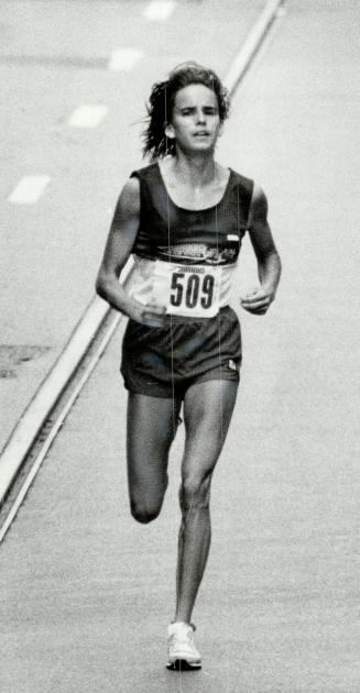 Queen of the road: York University's Nancy Rooks enjoyed a 48-second margin of victory in yesterday's 10-kilometre run