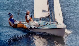 Don Behan, left, and lan Brown of Canada's National Sailing Team, know what it means to pay the price for racing glory