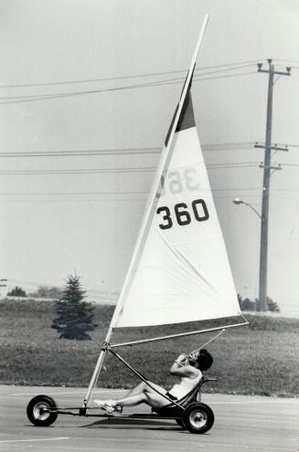 Lank yacht, Tracy McNaught, 17, sails Henry Street High School's wind buggy in Iroquois Park Arena in Whitby