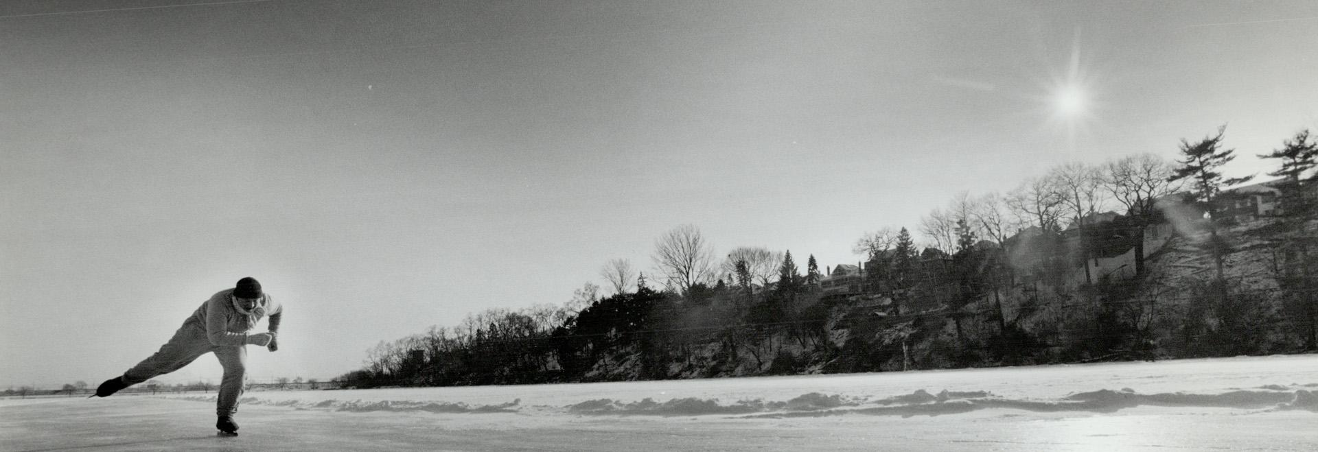 Paul Janacek, 43, glides across the ice yesterday on Grenadier Pond in High Park during his daily two-hour workout on speed skates. Janacek, an unempl(...)