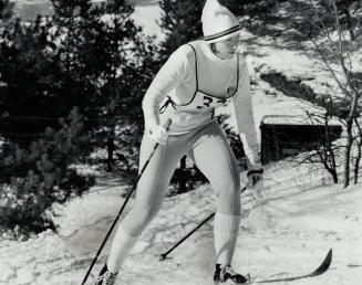 Skiing in a winter wonderland. On her way to victory in ladies' 5-kilometre event of Toronto Open cross-country ski championships, held at Summit area(...)