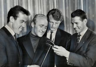 Pro skiers discuss tactics for beehive race at devil's Glen Sunday, From left: Ernst Hinterseer, Anderl Molterer, Hias Lietner, Pepi Gramshammer