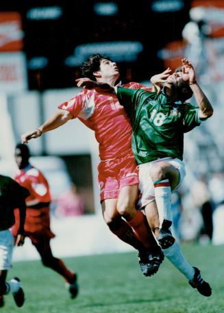 Pickering's Paul Peschisolido (left) was disappointed with his national soccer team's 2-1 loss to Mexico Sunday, but is still hopeful of Canada qualifying for World Cup