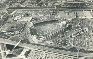 Aerial view of Exhibition Stidium and parking areas, looking north from Ontario Place, shows crowd of 54,386 fans, fewer than 30 were hauled off in paddy wagons