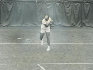 Temper! Temper! South African tennis star Bob Hewitt displays his annoyance by hurling his racquet to court during his third-round match yesterday at (...)