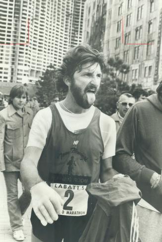 New York's Tom Fleming pants after marathon victory