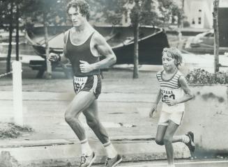 Believed to be the youngest competitor to complete the 26-mile marathon in the 95-year history of the Toronto Police Games, 8-year-old Bruce Lorimer r(...)