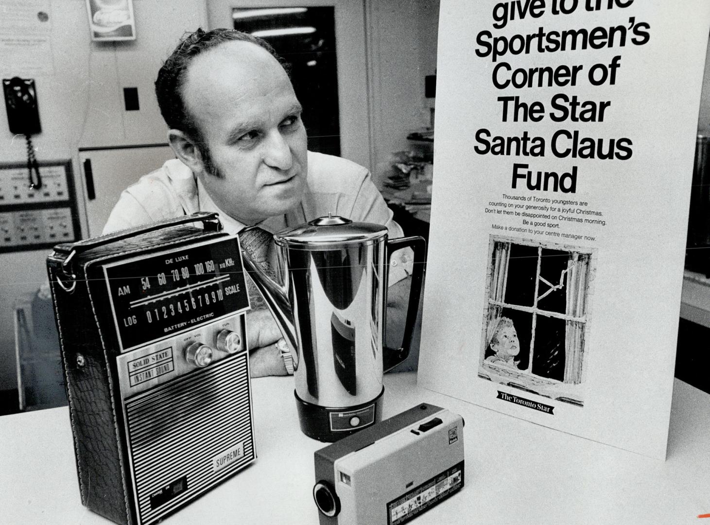 Prizes will worth the winning. Jack Kalb, proprietor of Cliffisde Bowl in Scarborough's Cliffside Plaza, displays some of prizes available to patrons (...)