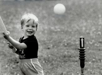 It's gotta be a homer! Two-year-old Jared Campbell wasn't concerned about all the Simcoe Day pomp and ceremony, or whether Metro's beaches were pollut(...)