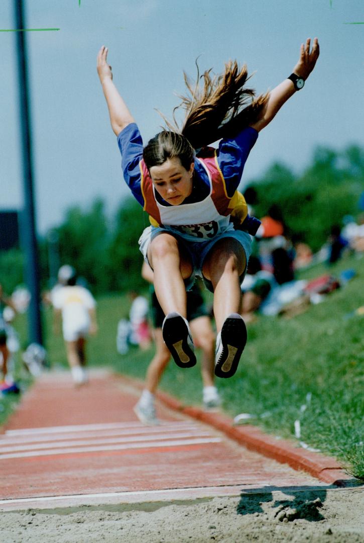 Third and long: Michael Power triple jumper Andrea Andrachuk landed third at Metro Regional high school track and field championships