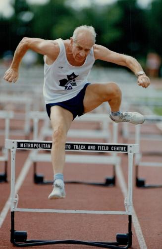 On the left, 70-years-old Canadian javelin thrower lan Hume unleashes a mighty toss in yesterday's action in the masters track and field at York Unive(...)