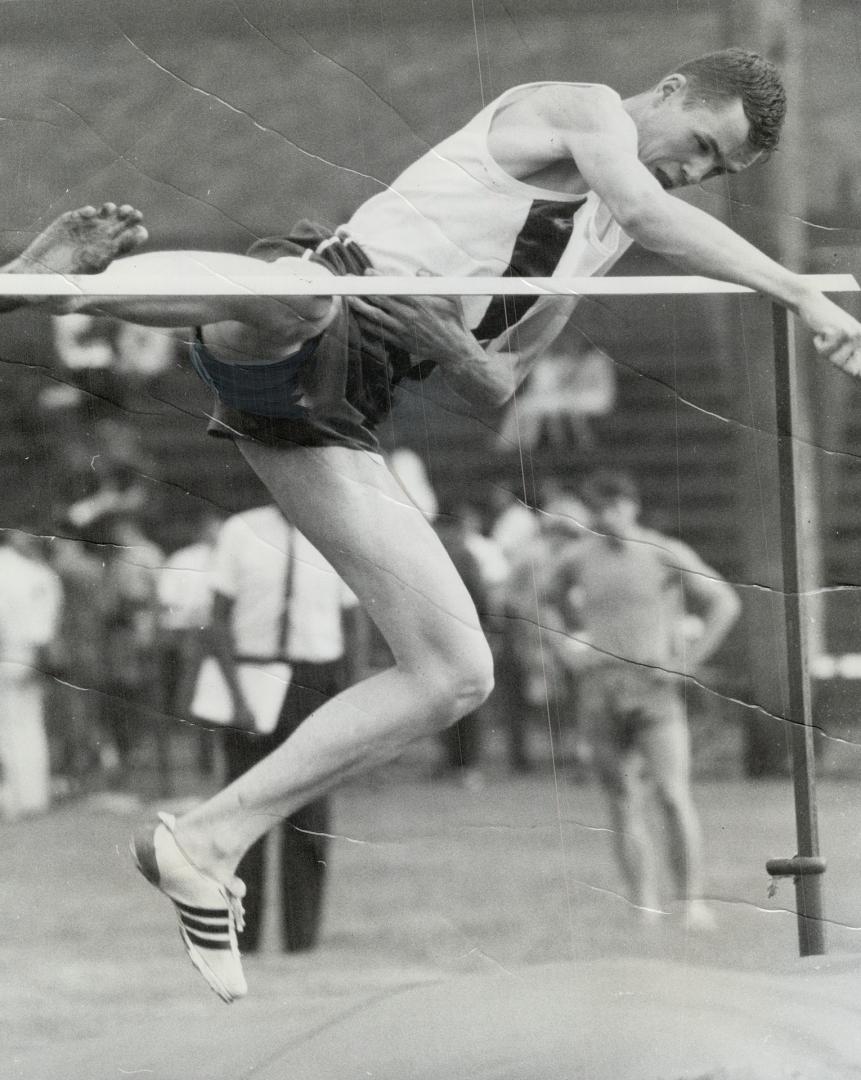 Denis Firth of Regina starts over the bar during high jump in Saturday's Centennial track meet at East York Stadium