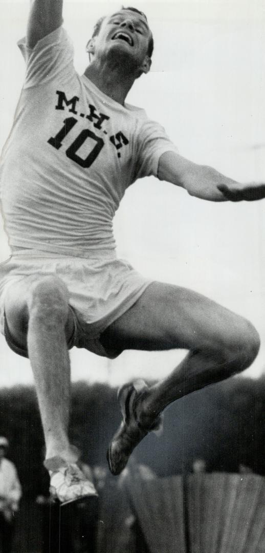 Bill Greenough of Nova Scotia is a laughing winner of triple jump Saturday