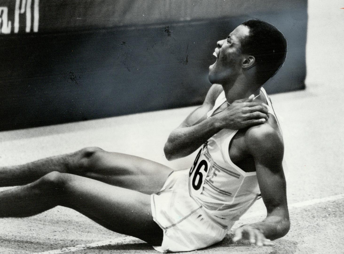 Painful start: Jerry Malaneux of Morgan State College in Maryland bellows in pain after he tumbled at the start of the men's 800 metres and was spiked by another competitor