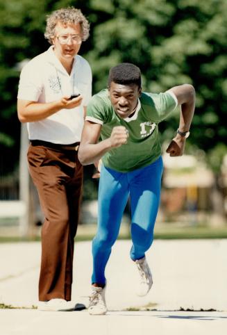 Life has changed for Vidal Rodrigues, 14, seen sprinting away from coach or mentor Bill Fedoruk who's timing his run