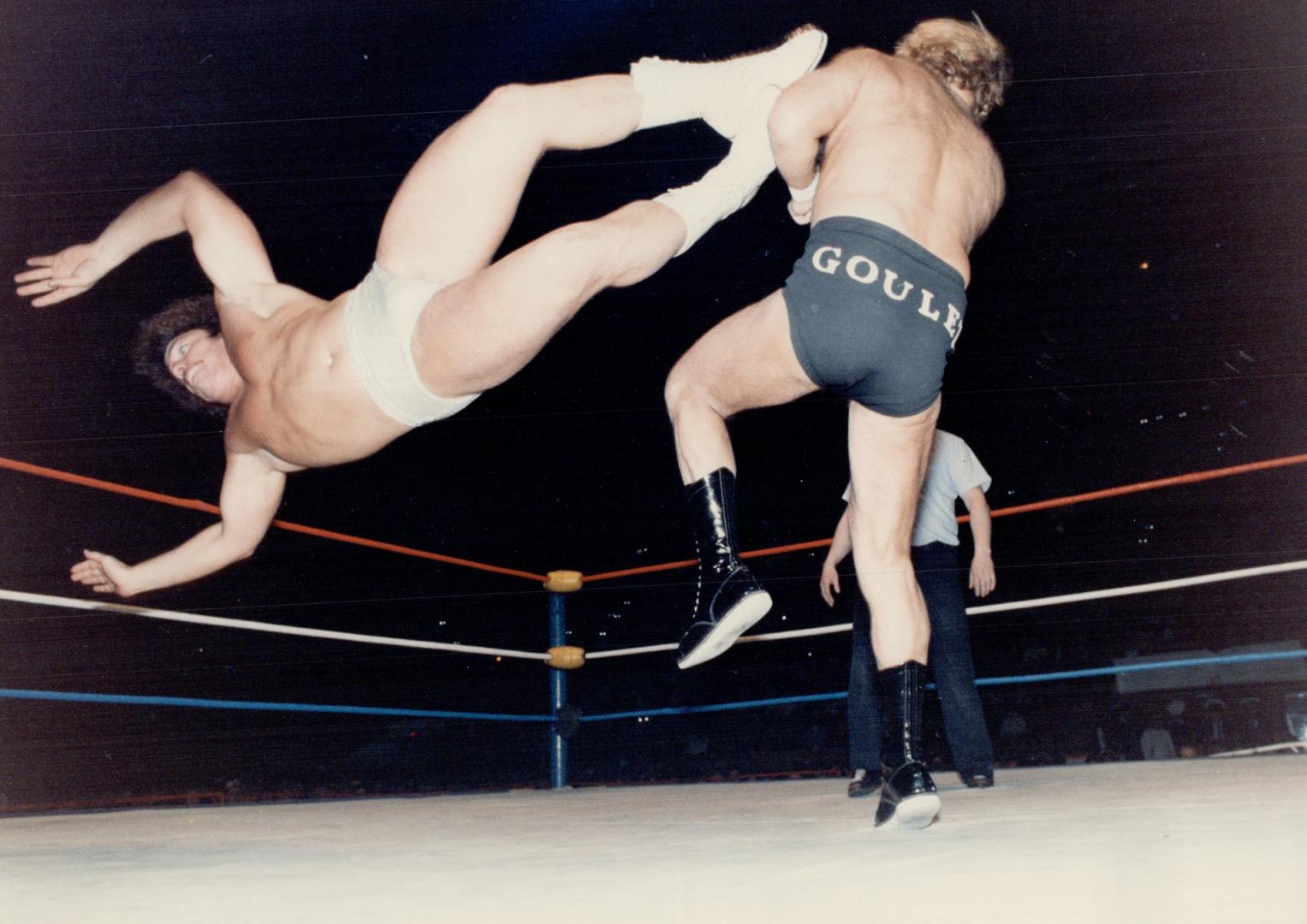 Leaping Lanny Poffo, kicking Goulet