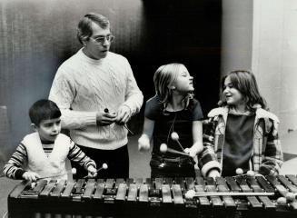 Do-re-mi time, Don Kuehn, a Toronto Sympercussionist, demonstrated various musical carborough's Albert Campbell Library