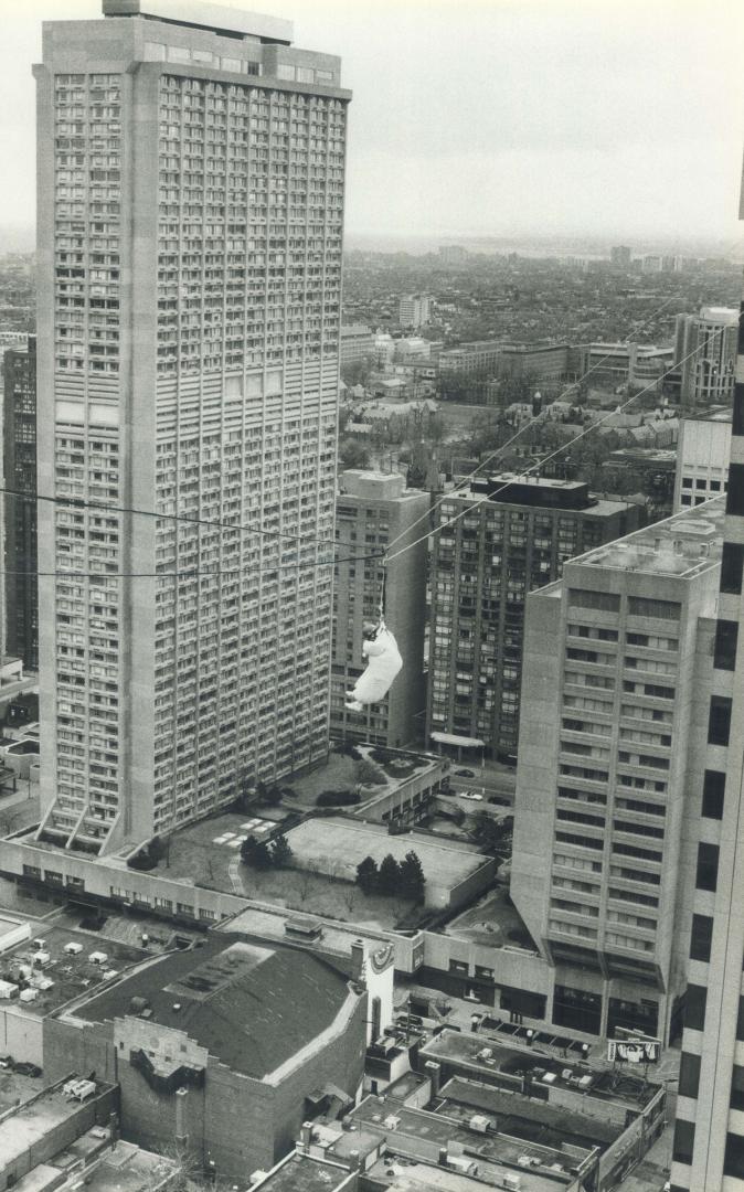 Comedian Marty Putz spends some time suspended 152 metres (500 feet) above Yonge and Bloor Sts