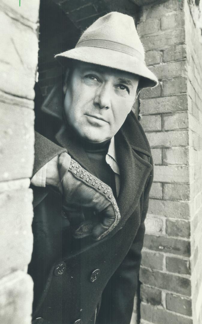 Henry Ramer, ever-present hat atop his head, outside Young People's Theatre, where he's on stage in The Diary Of Anne Frank. [Incomplete]