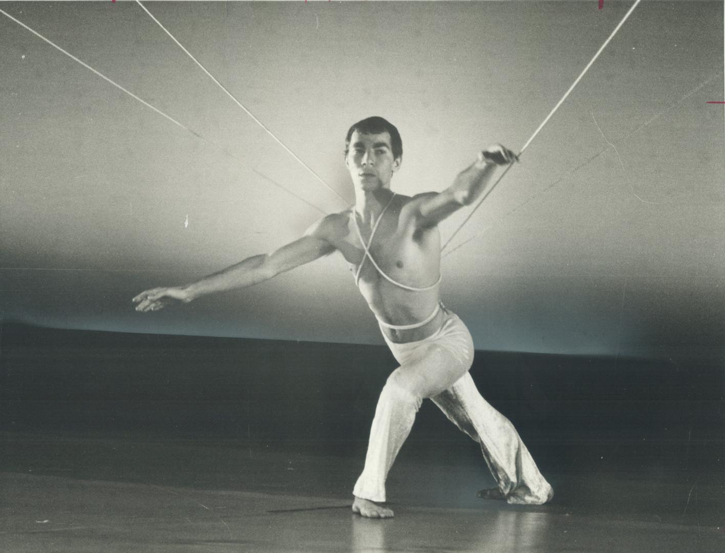 Toronto dance theatre director Peter Randazzo performs his solo work, Starscape, at the opening of the company's two-week fall season in the St. Lawrence Centre theatre last night. [Incomplete]