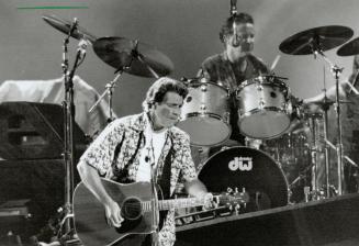 Glenn Frey on guitar Dan Henley on drums