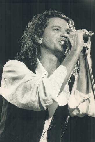 Rock Force: Lead singer Michael Hutchence is a strong force on stage, heading the rock band INXS at the CNE Grandstand last night in front of 24,500 fans