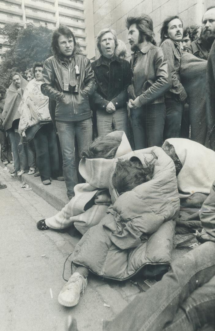 Thousands of fans of the Rolling Stones line up on Wood St