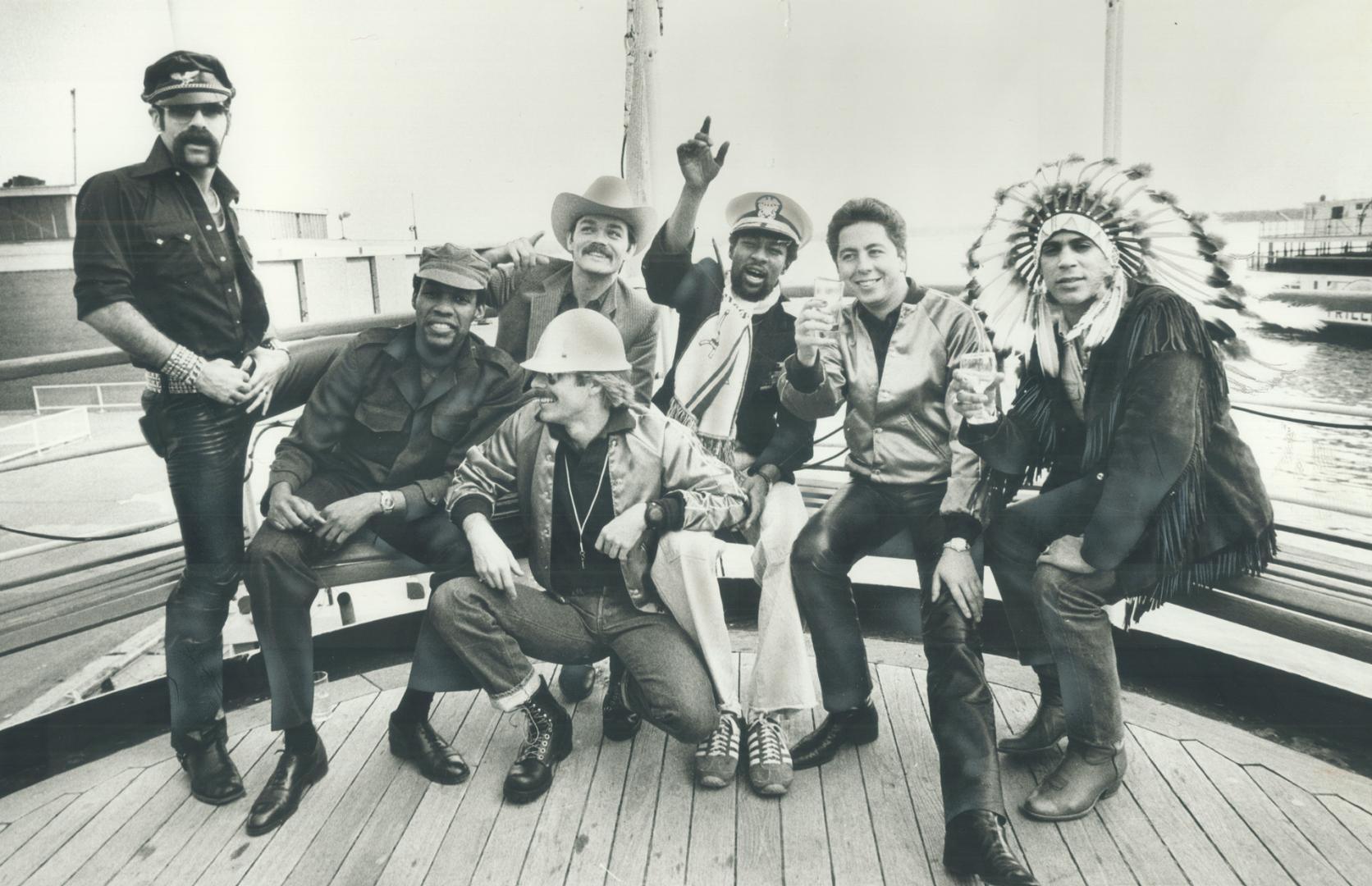 Village people at Captain John's boat-restaurant: From left: Glenn Hughes, Alex Briley, Cowboy Randy Jones Victor Willis, Felipe Rose, producer Jacques Morali, David Hodo