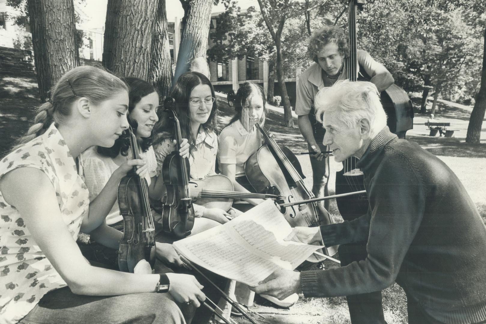 Chamber music members of National Youth Orchestra take outdoor break from rehearsals in the Edward Johnson Building of the University of Toronto. Thei(...)