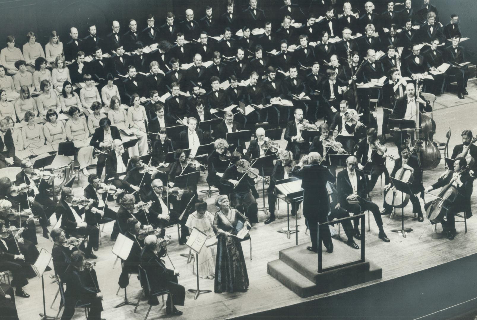 Contralto Patricia Rideout (to left of podium) sings with Mendelssohn Choir and Toronto Symphony ensemble at Massey Hall last night