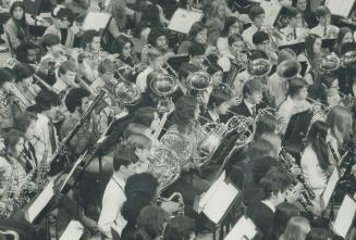 The sound of massed music. It was called the Sound Orgy of the Year and there was certainly lots of it resounding through Coliseum Arena of Exhibition(...)