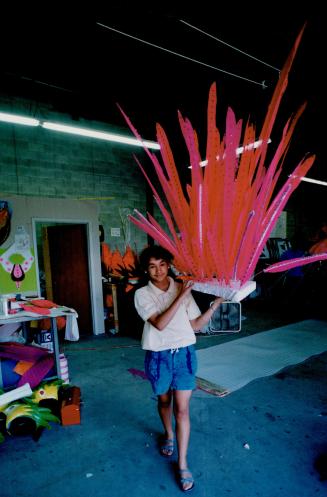 Preparing for Caribana. Caribana participant Melanie Ishmael is hoping for some luck from the Scarlet Ibis, Trinidad's protected bird, as she vies for(...)