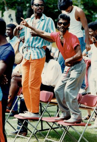 Music moved the crowds, whether to the sounds of an impromptu chairtop whistler or to the beat of a more professional band