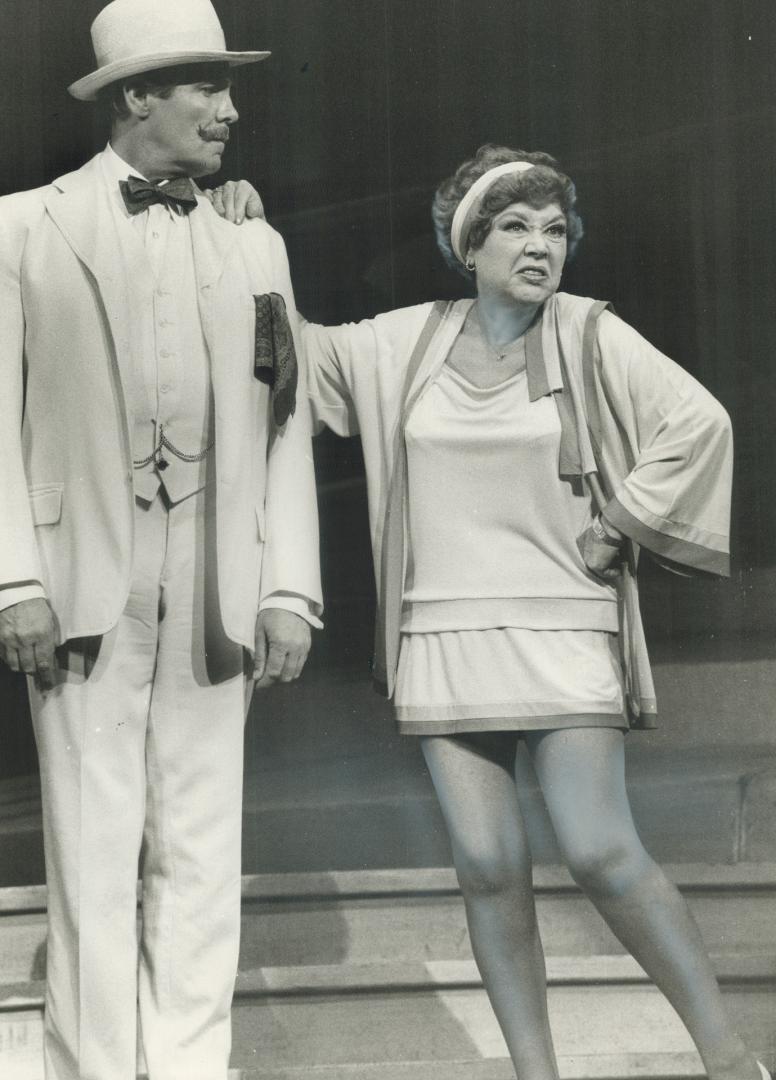 Derek Waring (left) and Glynis Johns in stage production of The Boyfriend, both dressed in 1920…